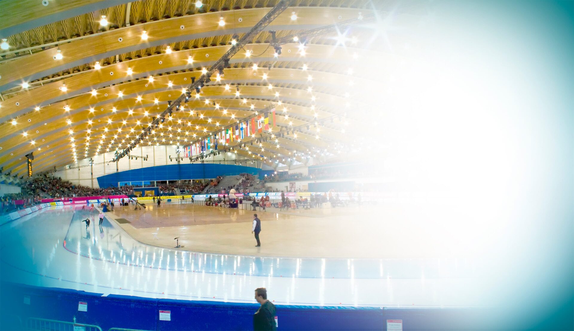 Photo of Richmond Olympic Oval with skaters inside the arena